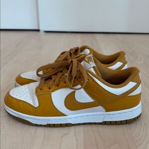 Nike Low-Top Dunk Sneakers in White and Mustard